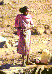 Woman at water well
